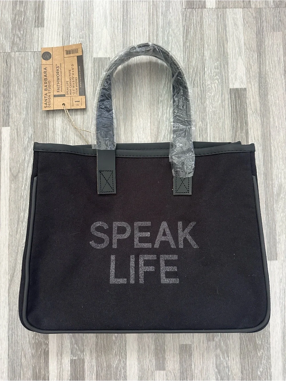Elegant Black Canvas and Leather Mini Handbag with 